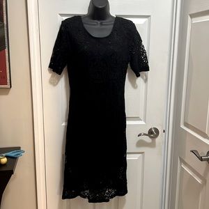 Beautiful Black lace dress with a low back & a shorter slip underneath.